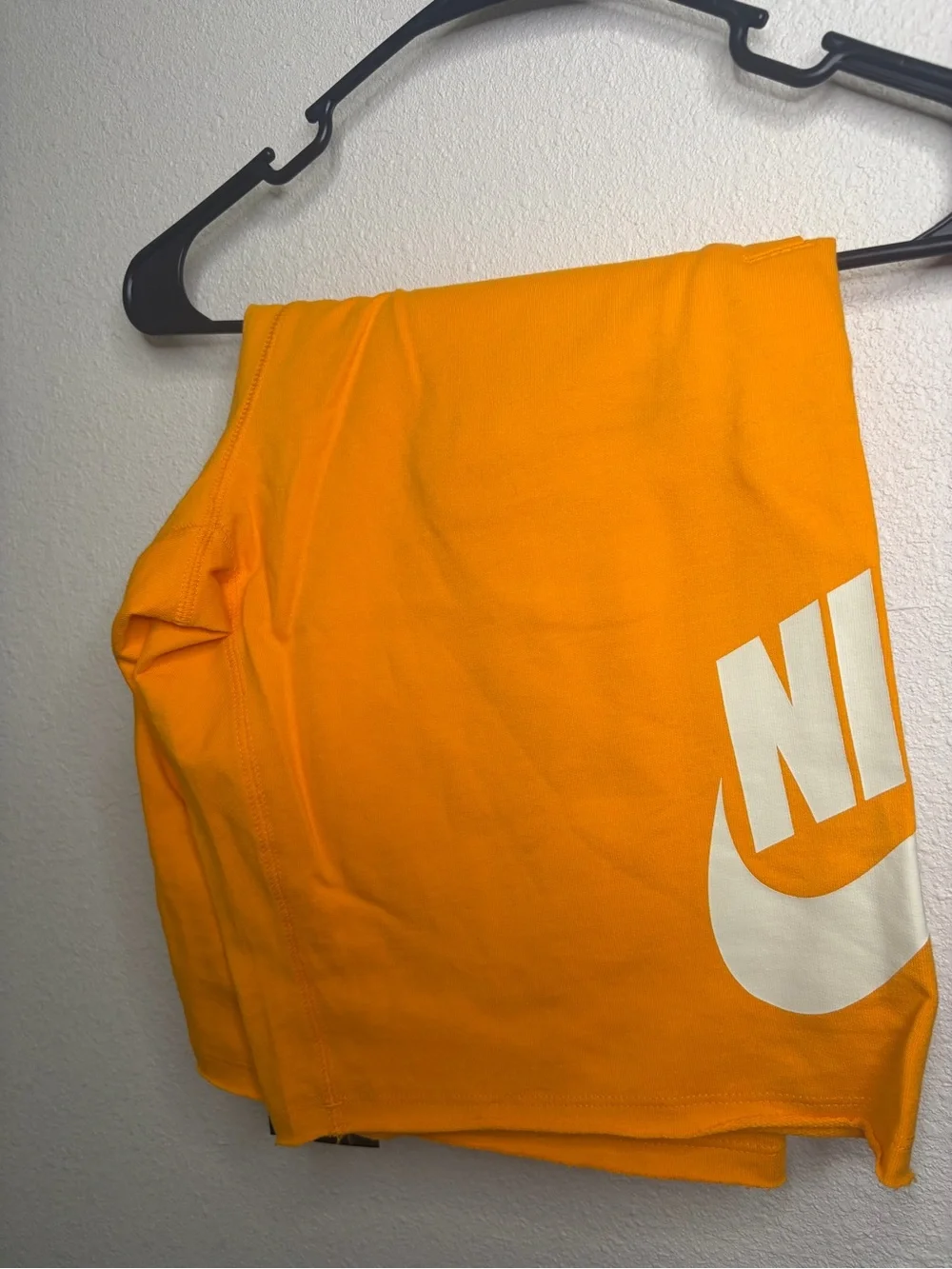 Nike Bright Orange Athletic Shorts with White Swoosh Tag